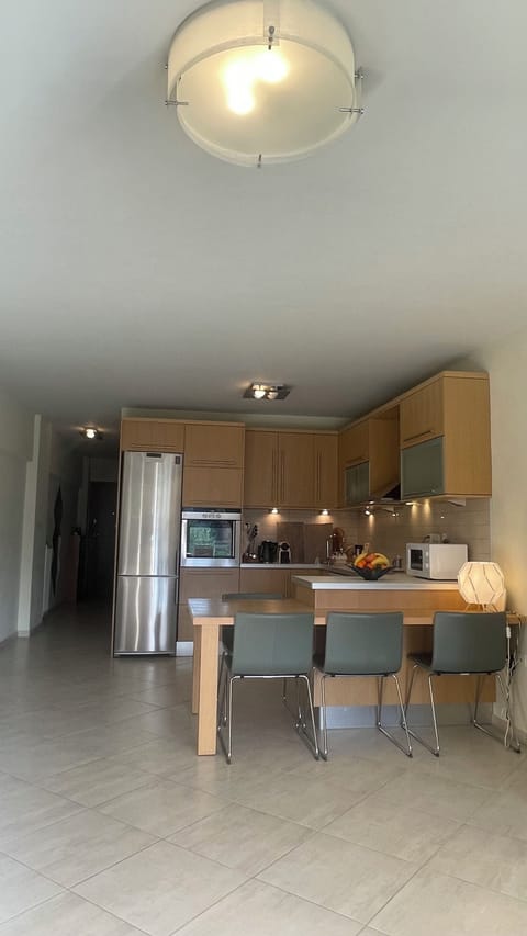 Large and modern, warm and cozy living room - open kitchen space view 