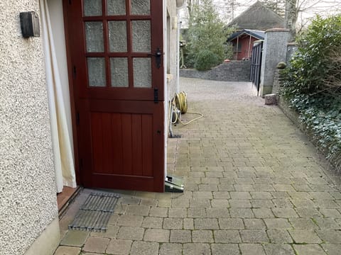 Park in front of Black gate. Seldom used. Private entrance into the apartment. 