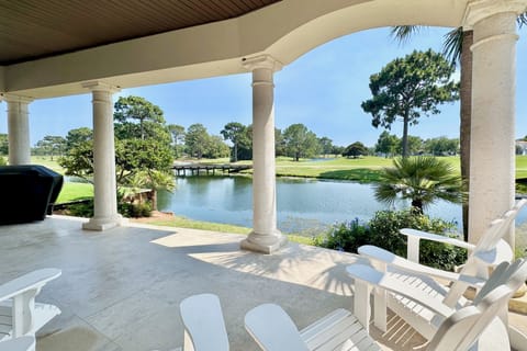 Back covered patio overlooking one of the golf course