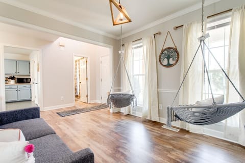 The half bath is by the front door.