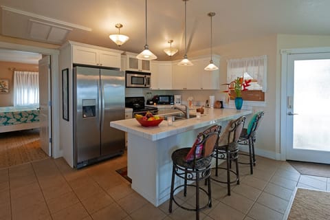 Plantation 1322 Kitchen - Plantation 1322 has an inviting kitchen and bar area