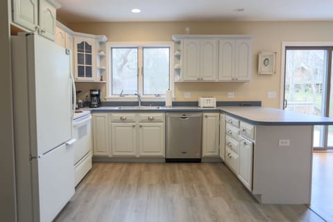 Create memories and share recipes in this beautifully updated kitchen