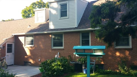 Back patio with assortment of flowers
