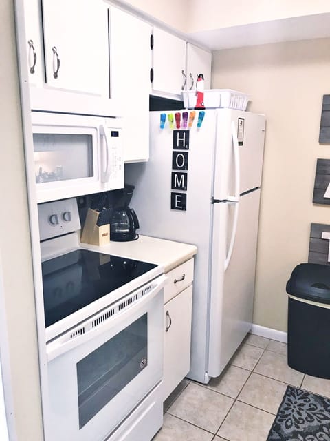 Brand new fridge, microwave and oven. Regular coffee pot