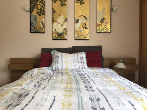 Downstairs bedroom! So comfortable Queen bed with built in nightstands. 