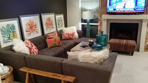 Enjoy the view of the beach from the living room while sitting on the comfy sofa