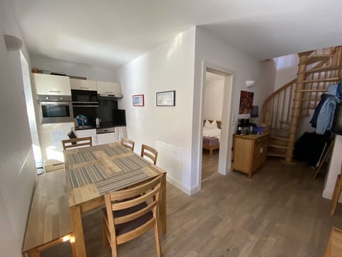 Dining, kitchen and living area