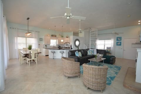 Beach-inspired open layout — relax, cook, and enjoy together