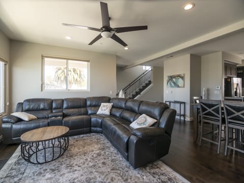The very spacious, open concept Living Room w/ Power Reclining Sectional