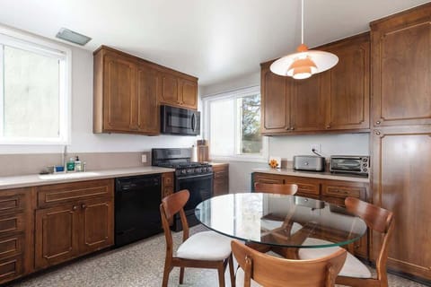 Inviting kitchen space with ample cabinets, natural light, and a cozy table for morning coffee or meals. 🍳✨
