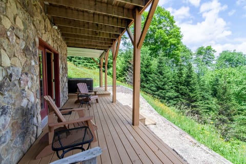 Outdoor Deck Space on Lower Level with Seating (see hot tub in the background)