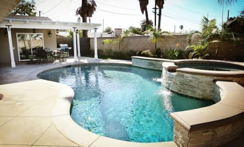Stunning In-ground Pool and Jacuzzi with Waterfall Features