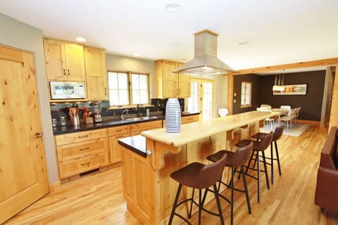 The bar seats an additional four people.