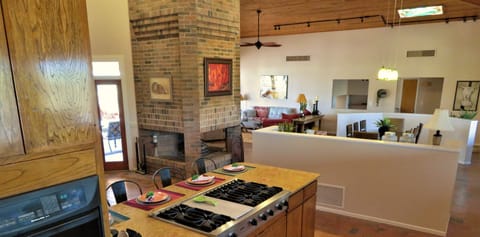 Wide open spaces with a fireplace focal point.