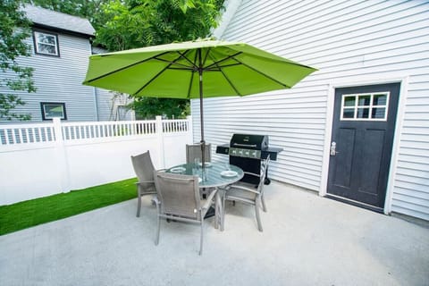 Patio | Privacy Fence, Outdoor Seating, Gas Grill