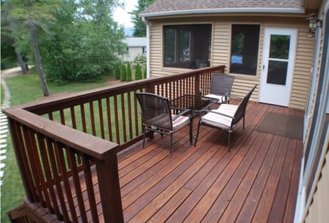 The deck off the porch has seating for four and great sunset views
