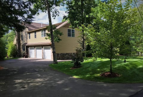 Featuring a 3 car garage and ample parking on a recently paved driveway