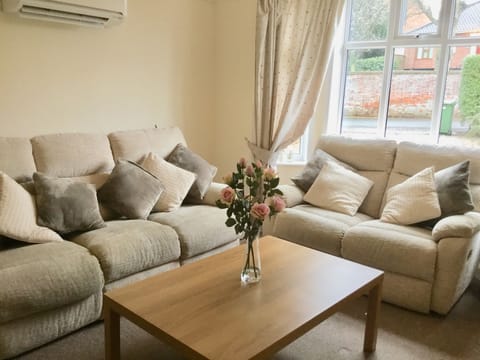 Lounge area looking out over carpark & driveway