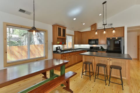 beautiful kitchen with large center island and plenty of seating