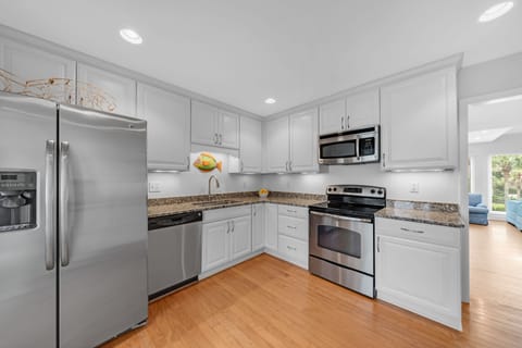 Enjoy the counter space and clean decor.