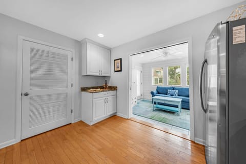 The sunporch is off the kitchen.