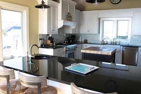 The gourmet kitchen has seating for 3 at the counter.