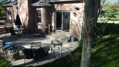 Patio with charcoal grill and wood burning chimenea.
