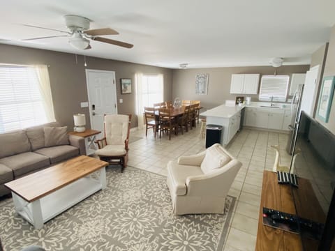 open concept living room, kitchen and eating areas