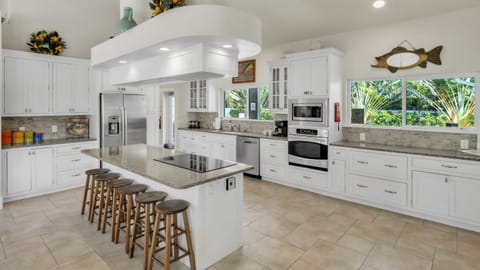 Fully equipped kitchen with modern appliances – AMI Beach House