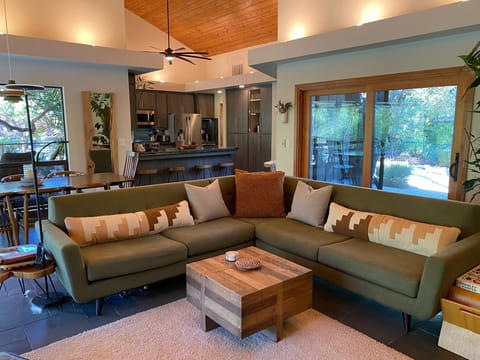 Living room with updated kitchen cabinets in 2022.   