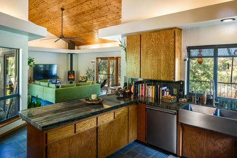 Main house kitchen/view of living room.
