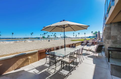 Wake up to sweeping bayfront  views from this spacious waterfront patio.