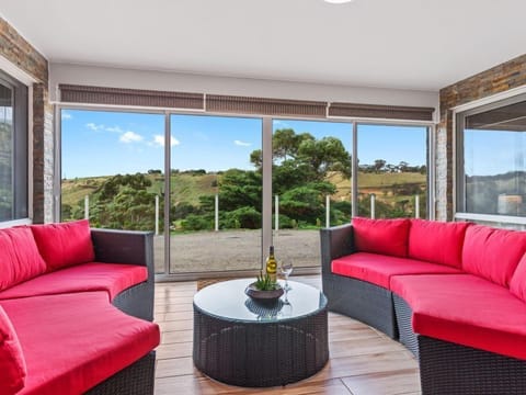 Comfortable and Bright Sun Room offering Ultimate Relaxation and Privacy