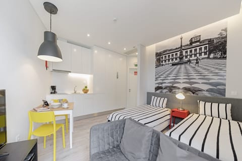 Livingroom , dining area , kitchen and Bedroom with two single beds. 