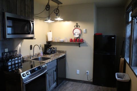 Kitchenette, dishwasher, refer, stove, micro, coffee pot, toaster