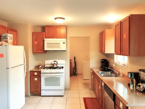 Big Kitchen with new refrigerator, oven & stove, dish washer, microwave, disposal, toaster, rice cooker, pans, pots, blender. 2 Coffee makers ( one for ground coffee, another one for kcup coffee) , kettle, double sinks and kitchen wares
