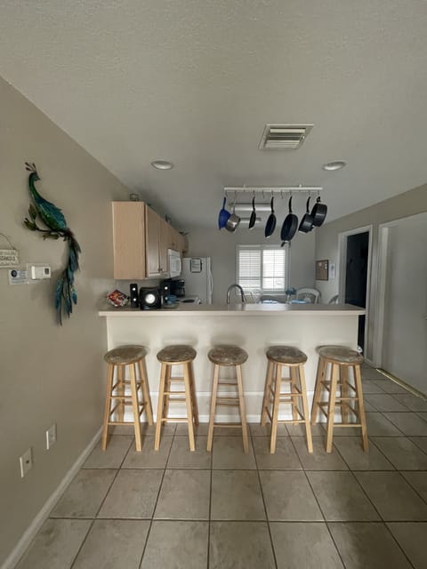 Living area facing kitchen area