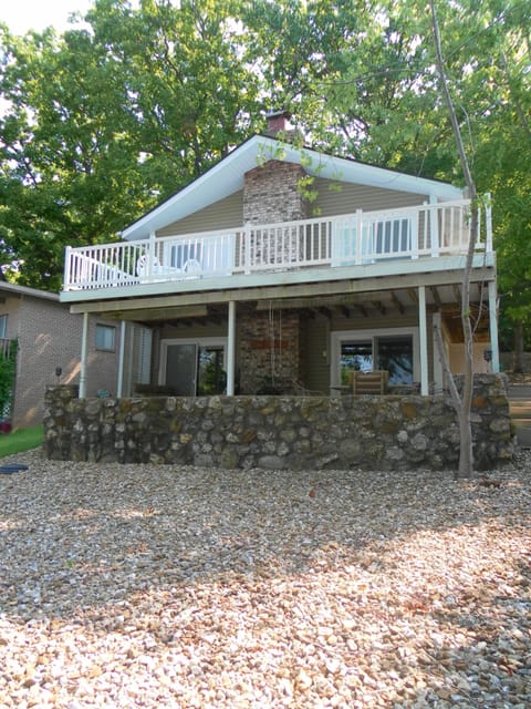 View of house from lake. Gradual slope to lake.