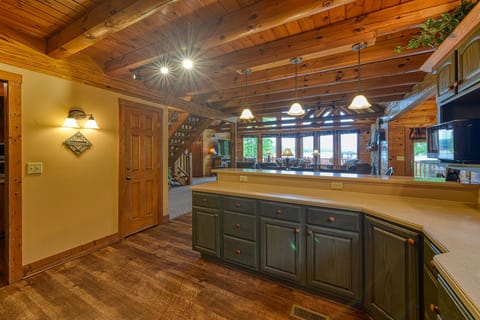 Look at the expansive kitchen, dining and great room