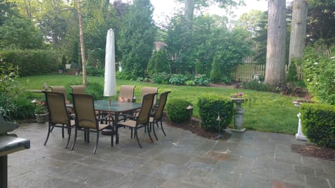 PRIVATE FROM OTHER NEIGHBORS BACK YARD. POOL BEHIND  BUSHES/ EVERGREENS   