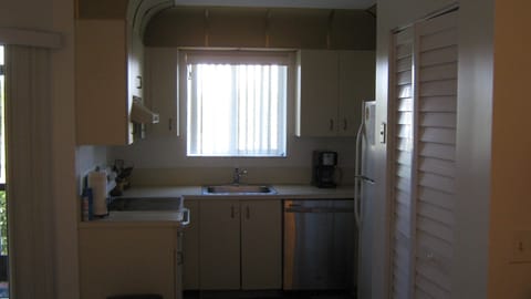 Kitchen fully stocked with dishes, silver, pots, fridge, stove, dishwasher, etc.