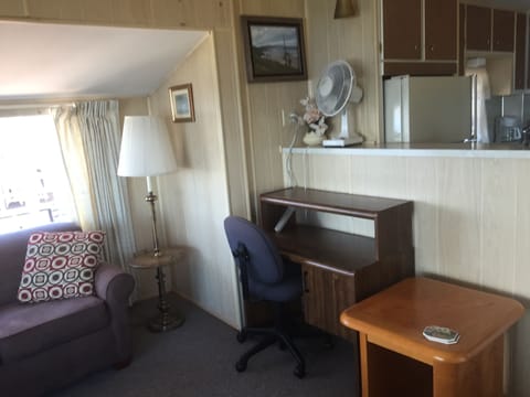 Couch turns into a second bed. Desk and fan are available.