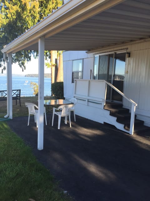 Entry is under the carport. Enjoy the view while picnicking.