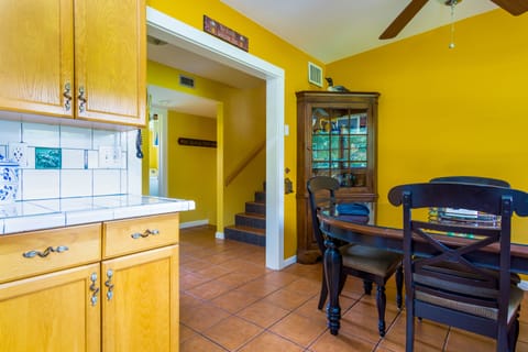 Table seats 4 comfortably, 2 extra chairs in the front closet.