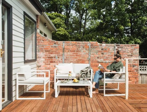 The furnished sundeck offers a wonderful space to soak up the sun and enjoy the outdoors. Gather with friends or family for alfresco dining or simply relax and take in the views.