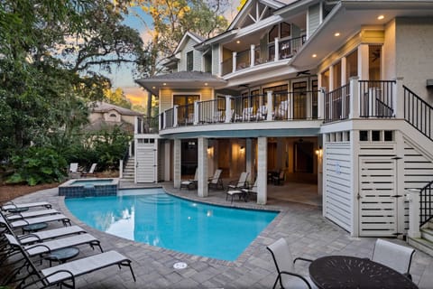 Back of the house. Pool and spa (heated for a fee).