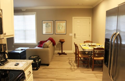 View of living room and dining area from kitchen