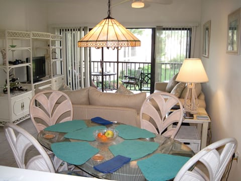 THE LOUNGE/DINER WITH THE LANAI BEYOND