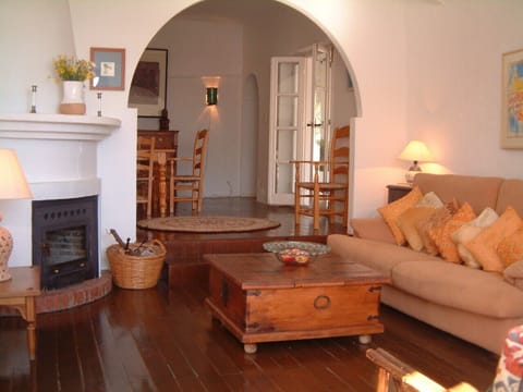 Beamed ceilings and wood floors give character