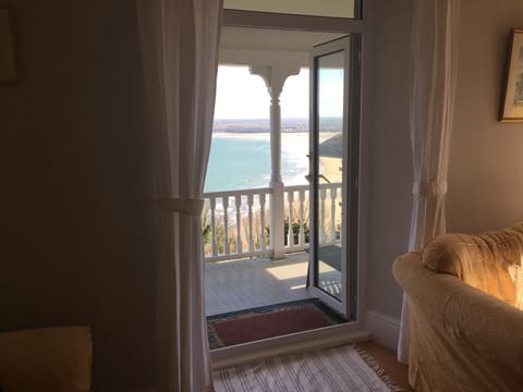 View from living Room over balcony to beach 200 ft below!